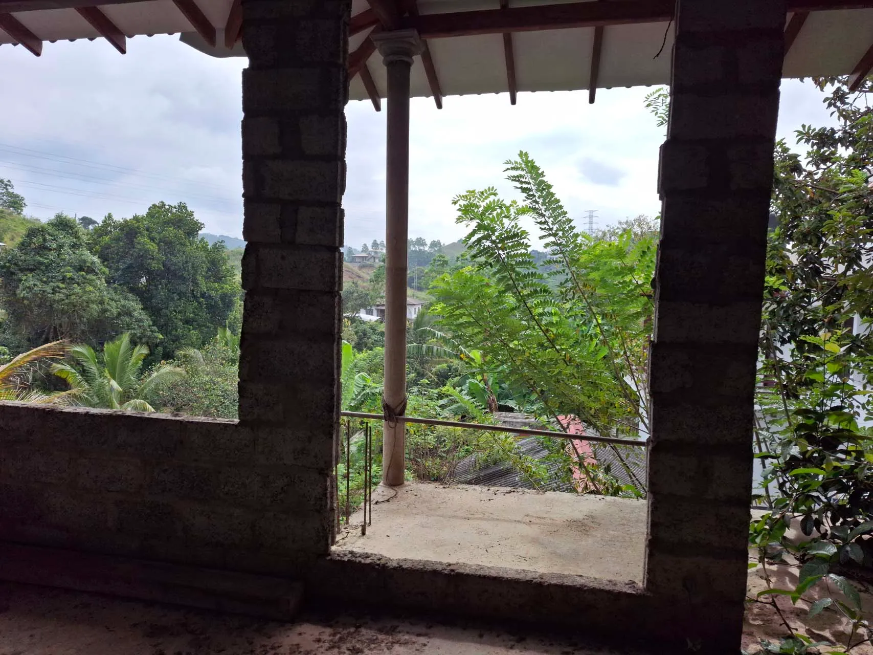 Top-floor balcony structure before railings and finishes